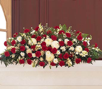 Hope and Honor Full Casket Spray by Rich Mar Florist