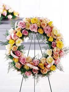 Vibrant Sympathy Wreath by Rich Mar Florist